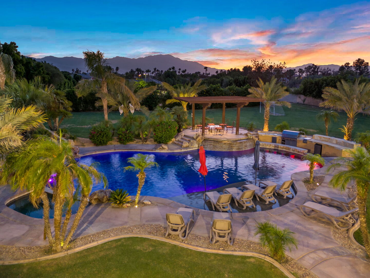 A California desert estate outdoor living area at golden hour